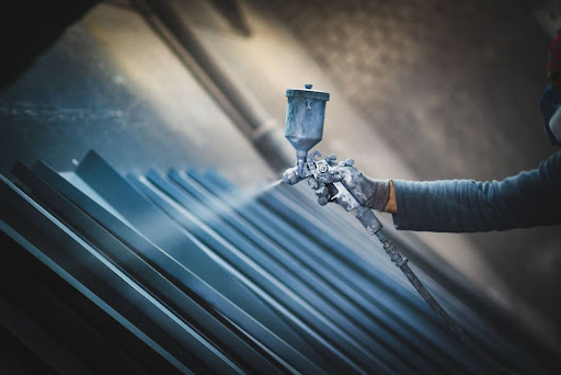 Powder based paint applied to metal beams